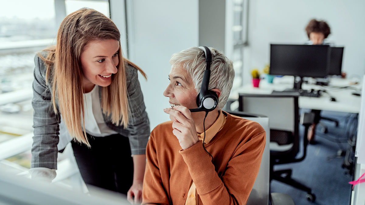 Smiling customer support operator at work