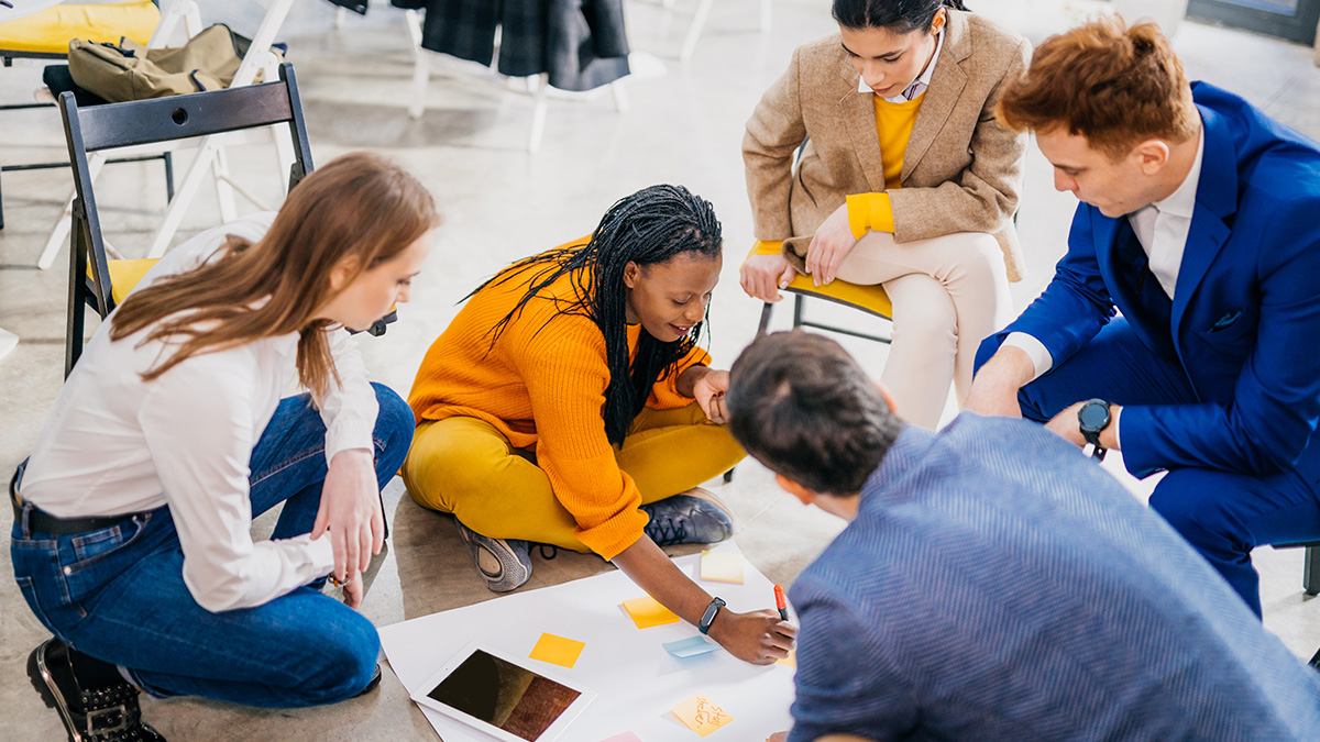 Group of business people brainstorming a solution