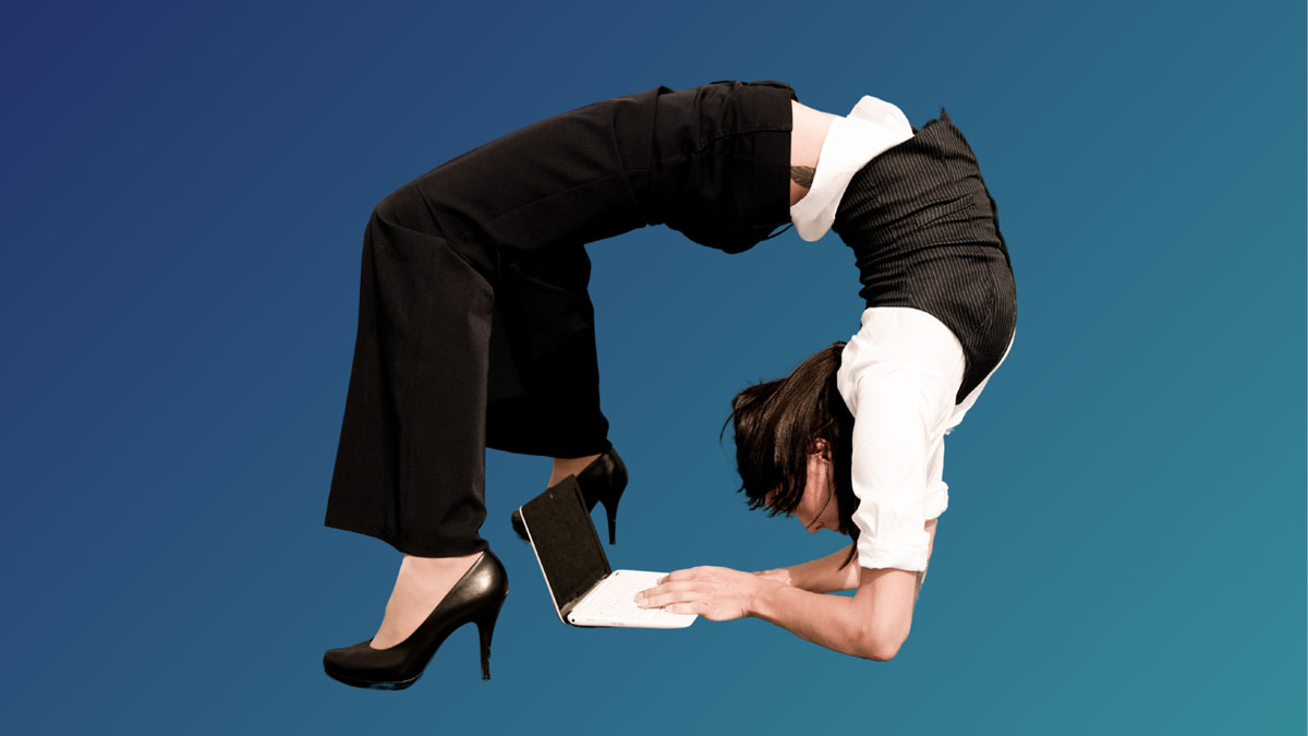 Woman in business clothes doing a back bridge